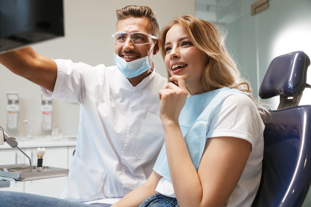 West richland family dentist explaining sealants to female patient