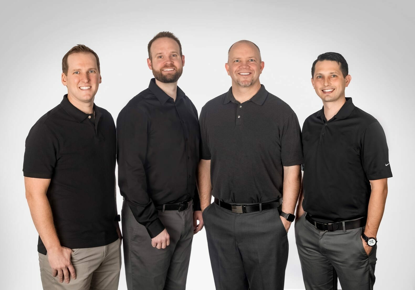 WRFD-Group-WEB3 The dentists at West Richland Family Dental. From left to right, Michael Maxfield, Jarom Smith, Jason Madsen, and Wes Karlson